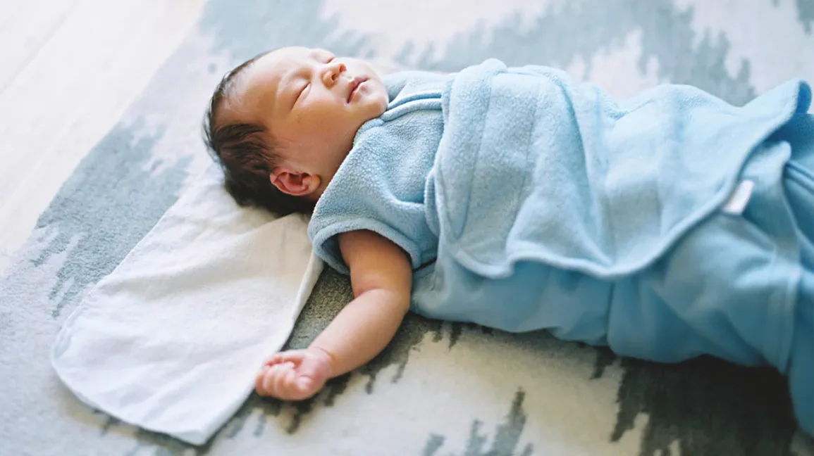 How to Dress a Baby Under a Swaddle.jpg